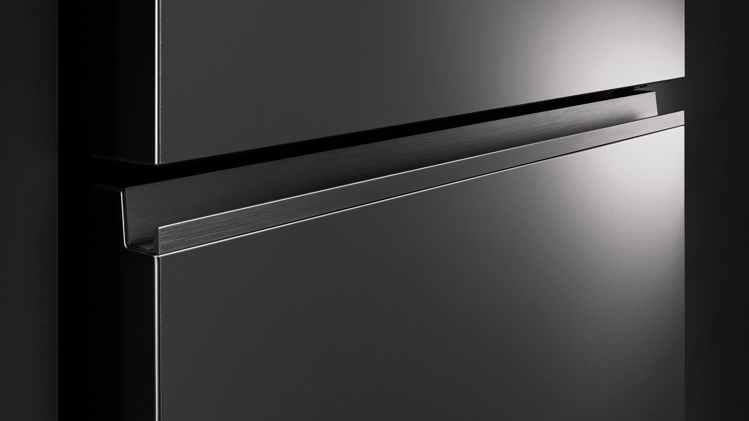 Freestanding stainless steel refrigerator with a contemporary single-door design